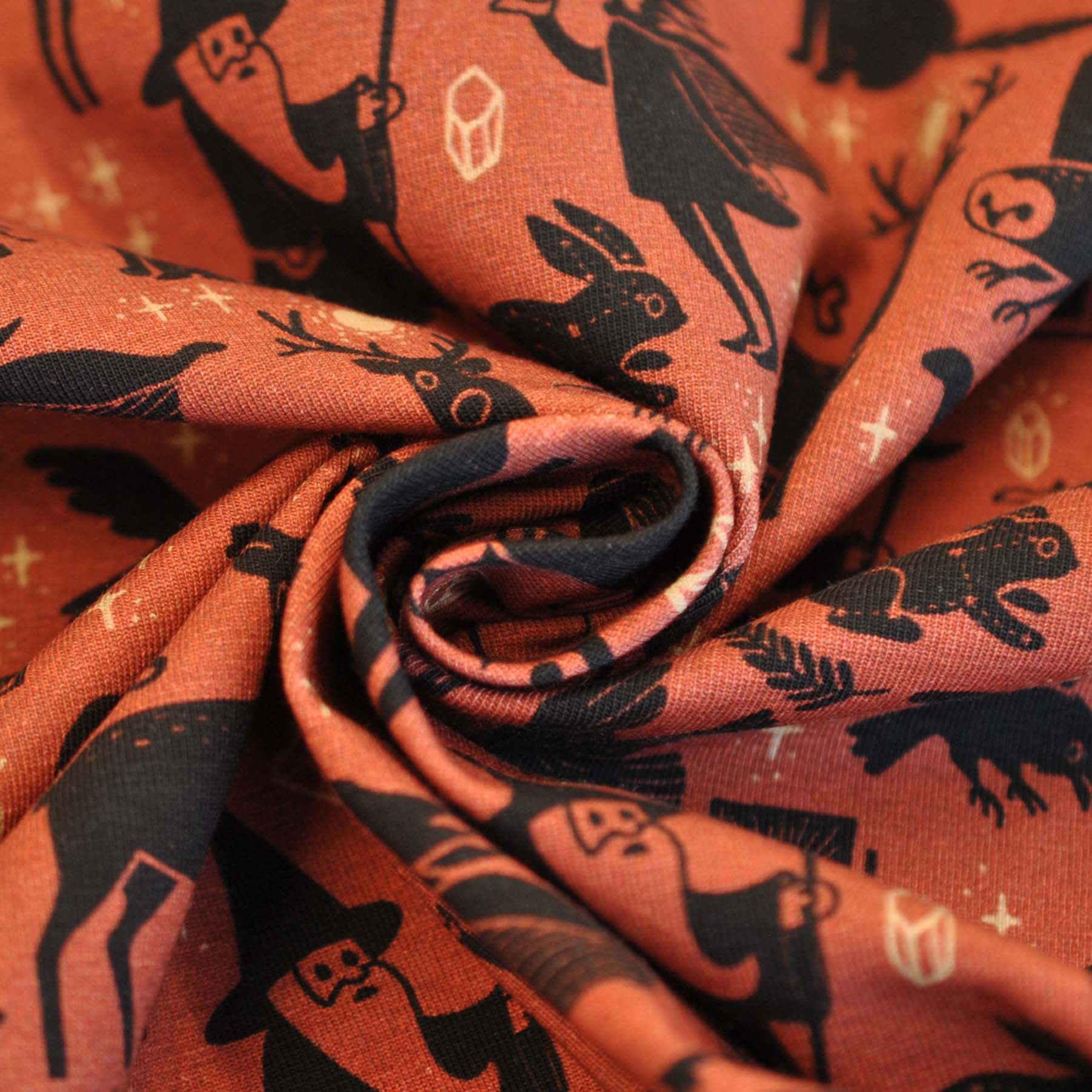 Cotton Jersey Folktale by Käselotti Magicians and Animals in Black and Rust - Image 3
